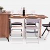 Wooden dresser with built-in table extension opened as a dining table for 5 people